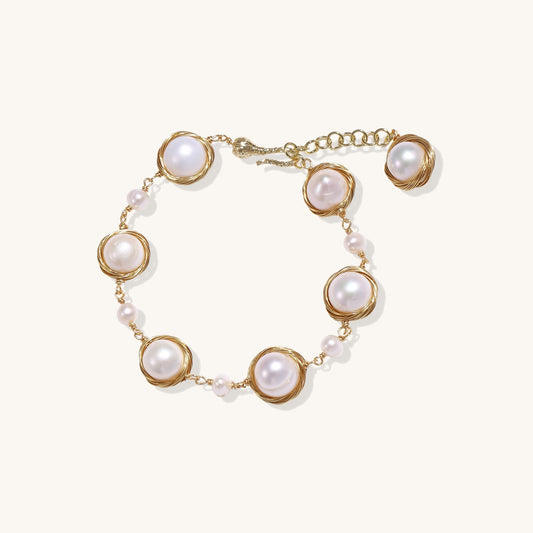 14K gold plated bracelet featuring wire-wrapped freshwater pearls in nest-like settings with adjustable chain closure