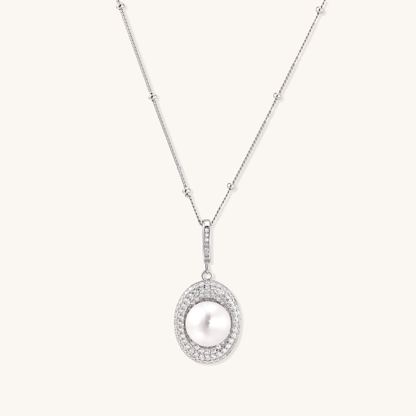 Sterling silver necklace with freshwater pearl in sparkling crystal halo pendant on delicate beaded chain