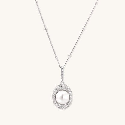 Sterling silver necklace with freshwater pearl in sparkling crystal halo pendant on delicate beaded chain