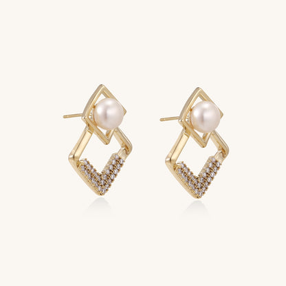 Gold-plated geometric drop earrings with freshwater pearls in square frames and crystal-accented diamond-shaped dangles