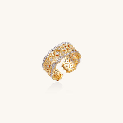 Bold geometric ring with lattice pattern in gold-plated brass featuring multiple tiers of sparkling zirconia stones