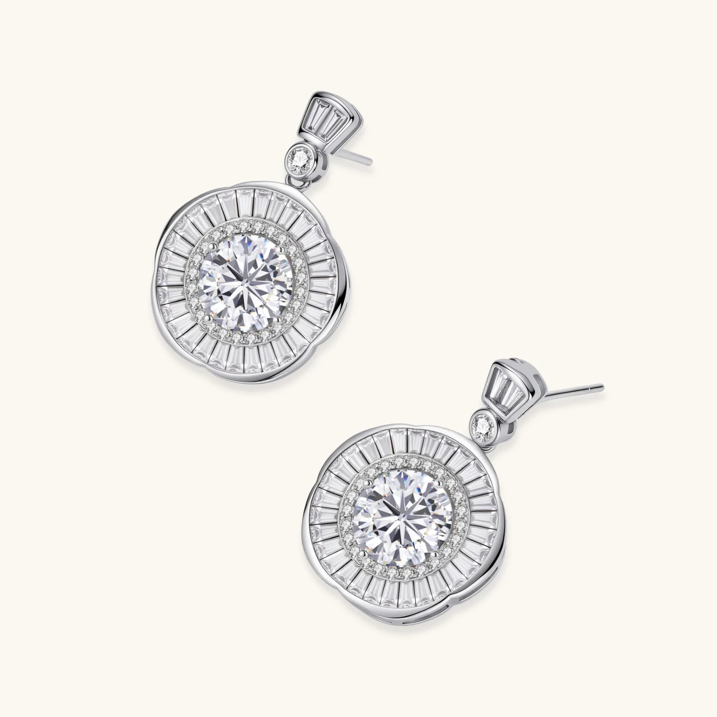 Art Deco-inspired sterling silver drop earrings with tiered moissanite stones in geometric sunburst design