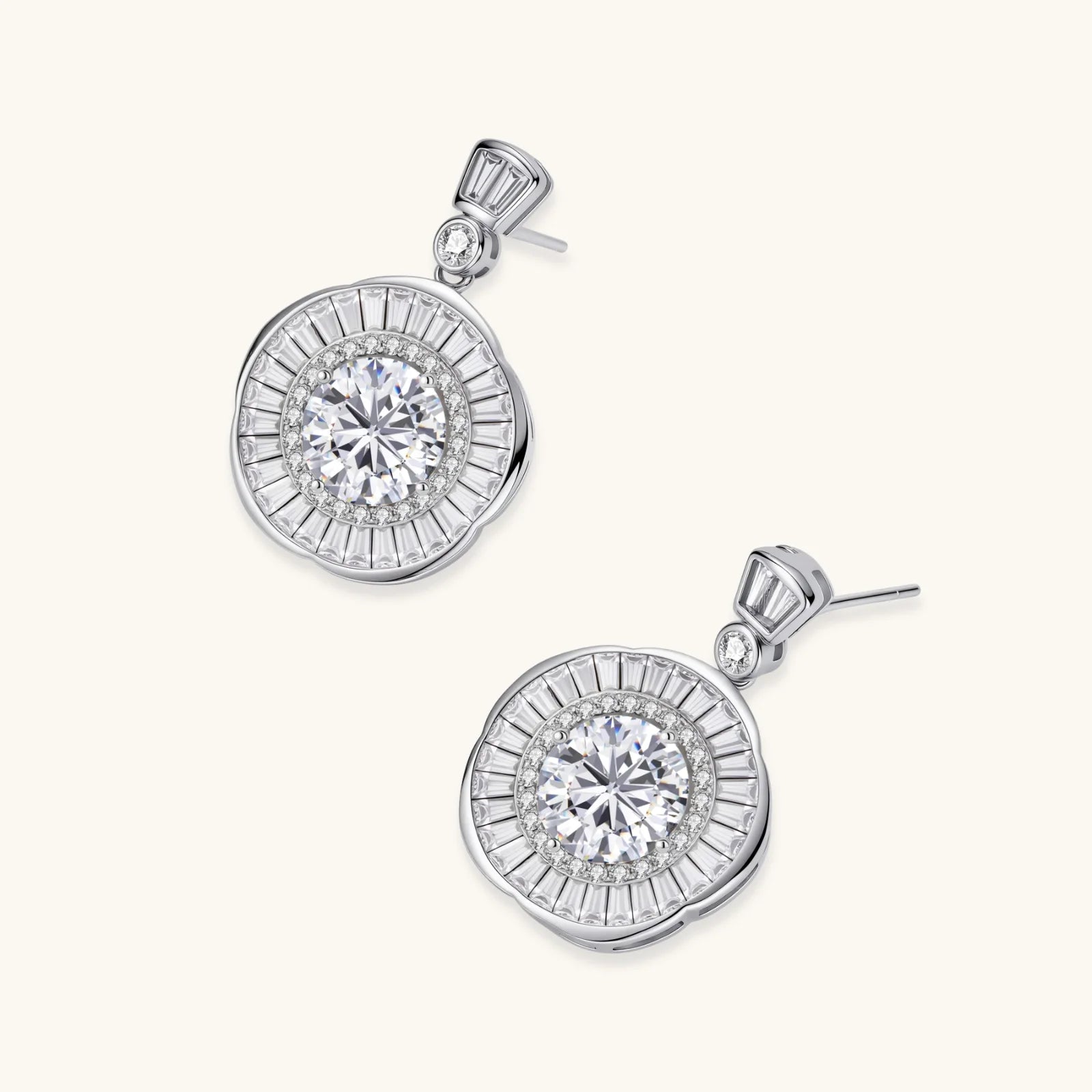 Art Deco-inspired sterling silver drop earrings with tiered moissanite stones in geometric sunburst design
