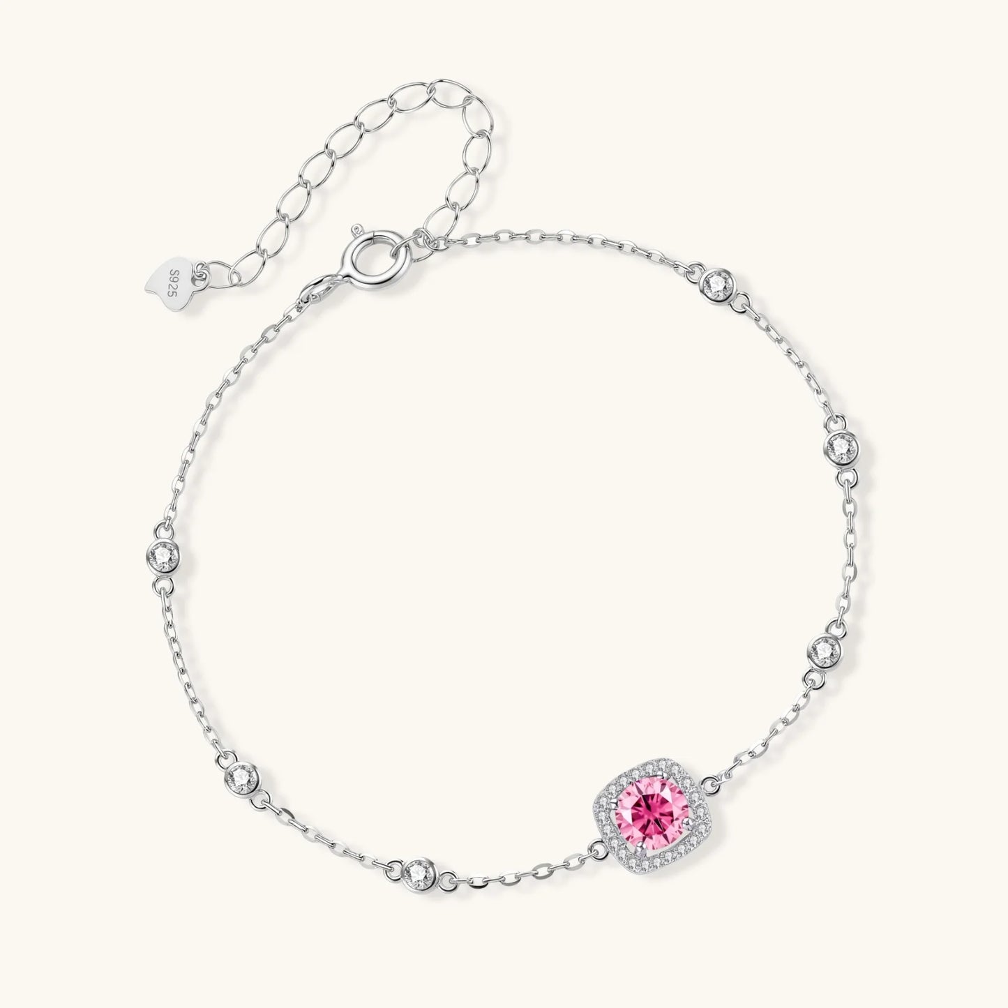 Elegant sterling silver chain bracelet featuring pink moissanite center stone in cushion halo setting with adjustable clasp