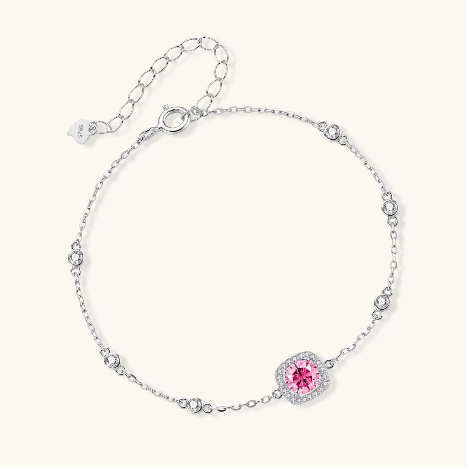 Elegant sterling silver chain bracelet featuring pink moissanite center stone in cushion halo setting with adjustable clasp