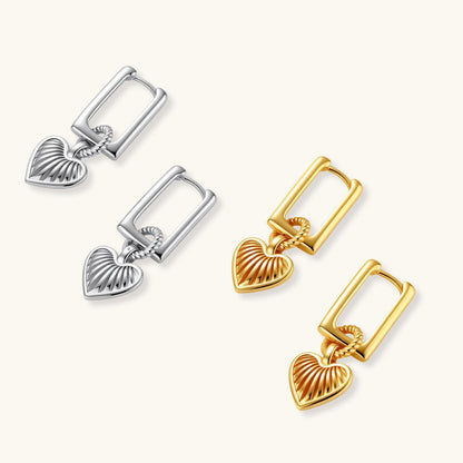 Platinum-plated 925 sterling silver rectangular hoop earrings with twisted ring connector and ribbed heart charm pendant.