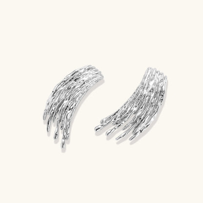 Silver-toned earrings with flowing liquid-like strands cascading downward, made from eco-zinc alloy with S925 posts
