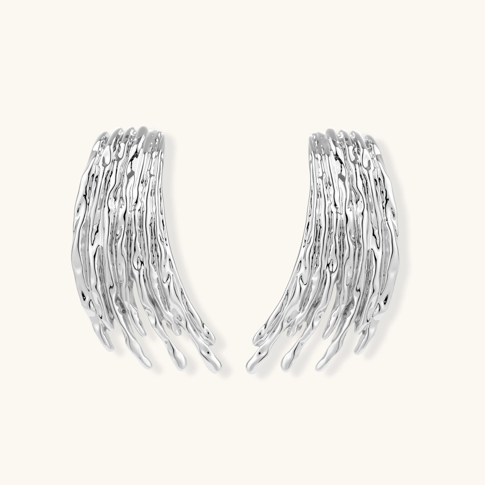 Silver-toned earrings with flowing liquid-like strands cascading downward, made from eco-zinc alloy with S925 posts