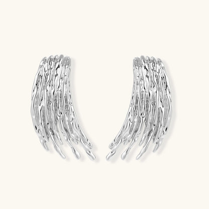 Silver-toned earrings with flowing liquid-like strands cascading downward, made from eco-zinc alloy with S925 posts